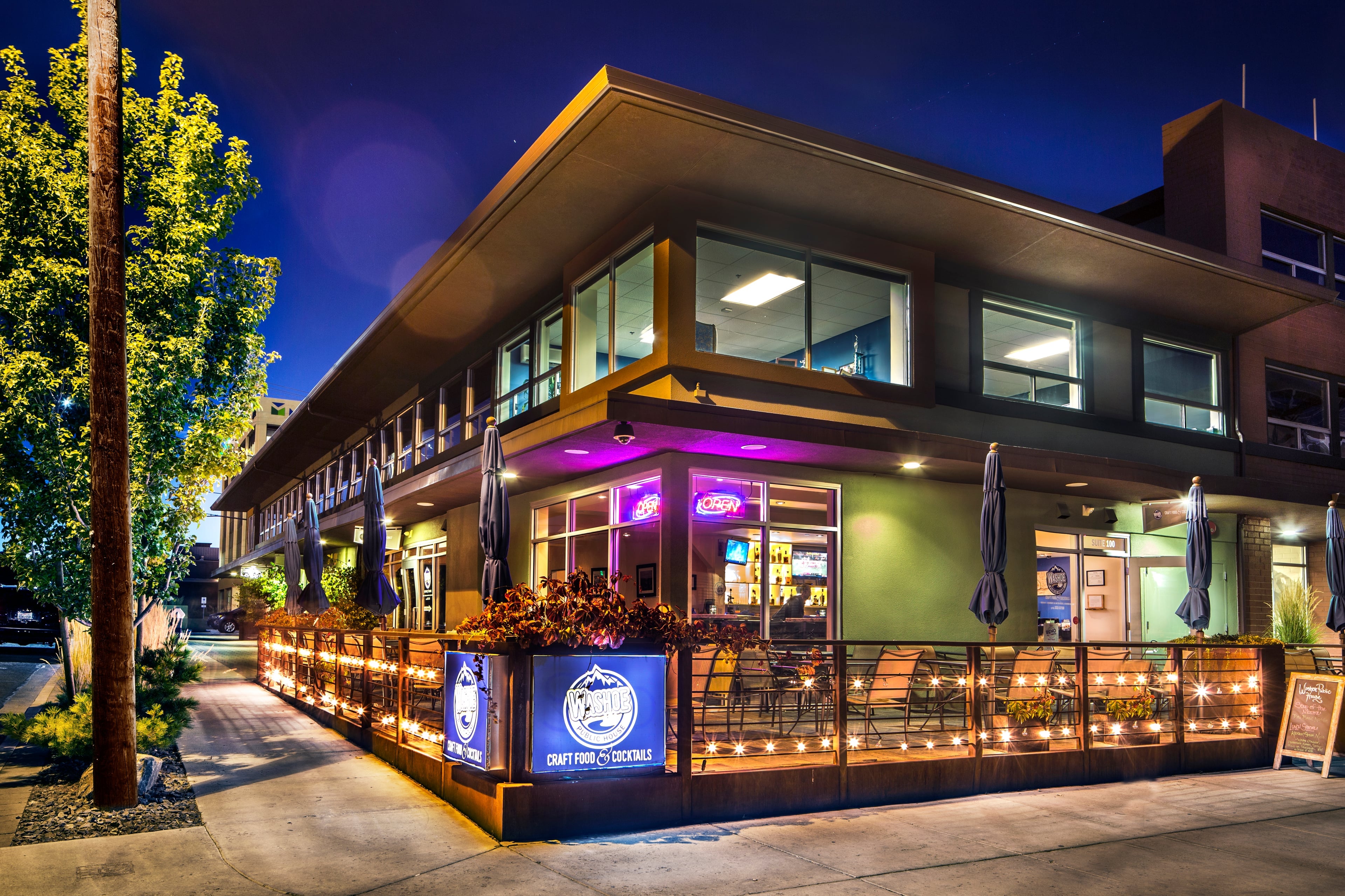 Washoe Public House restaurant and patio at dusk in Midtown Reno